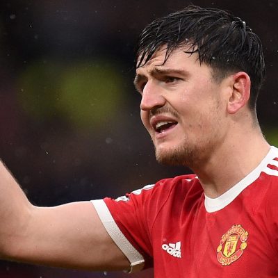 Manchester United's English defender Harry Maguire reacts during the English Premier League football match between Manchester United and Southampton at Old Trafford in Manchester, north west England, on February 12, 2022. - RESTRICTED TO EDITORIAL USE. No use with unauthorized audio, video, data, fixture lists, club/league logos or 'live' services. Online in-match use limited to 120 images. An additional 40 images may be used in extra time. No video emulation. Social media in-match use limited to 120 images. An additional 40 images may be used in extra time. No use in betting publications, games or single club/league/player publications. (Photo by Oli SCARFF / AFP) / RESTRICTED TO EDITORIAL USE. No use with unauthorized audio, video, data, fixture lists, club/league logos or 'live' services. Online in-match use limited to 120 images. An additional 40 images may be used in extra time. No video emulation. Social media in-match use limited to 120 images. An additional 40 images may be used in extra time. No use in betting publications, games or single club/league/player publications. / RESTRICTED TO EDITORIAL USE. No use with unauthorized audio, video, data, fixture lists, club/league logos or 'live' services. Online in-match use limited to 120 images. An additional 40 images may be used in extra time. No video emulation. Social media in-match use limited to 120 images. An additional 40 images may be used in extra time. No use in betting publications, games or single club/league/player publications. (Photo by OLI SCARFF/AFP via Getty Images)